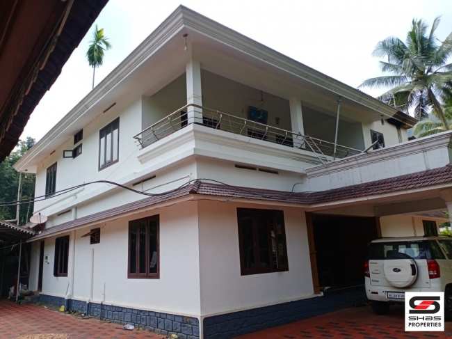 Land with house for sale in Paingottoor, Ernakulam