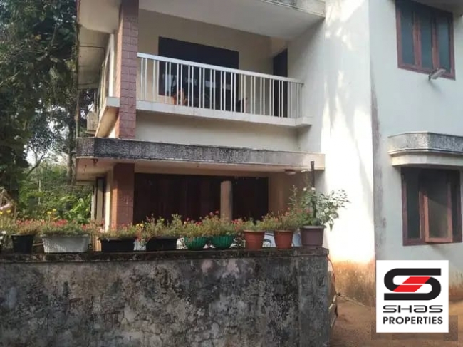 House plot with a house for sale at Mele chovva, Kannur