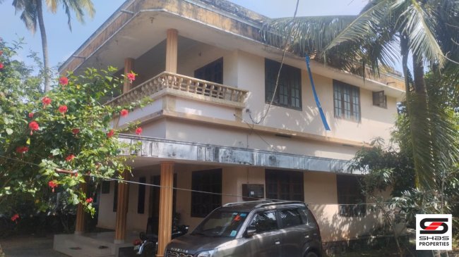 Land with house for sale in Payyambalam, Kannur