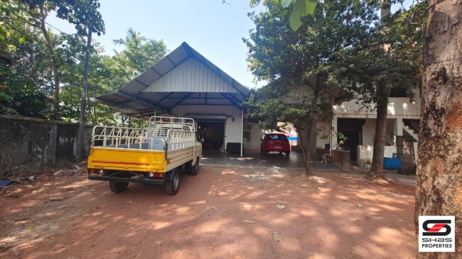 Land with house and godown for sale at Thalikkavu, Kannur