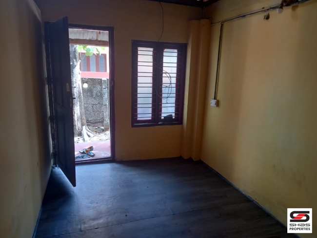 Plot with a house for sale at Thattamala, Kollam