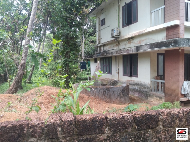 House plot with a house for sale at Mele chovva, Kannur