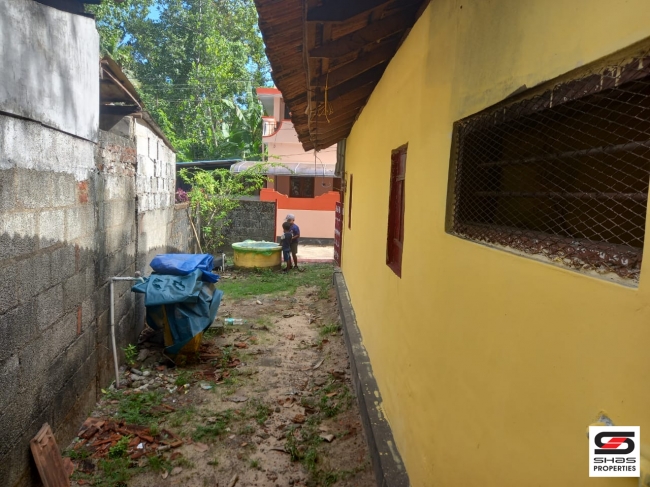 Plot with a house for sale at Thattamala, Kollam