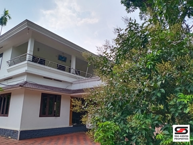 Land with house for sale in Paingottoor, Ernakulam