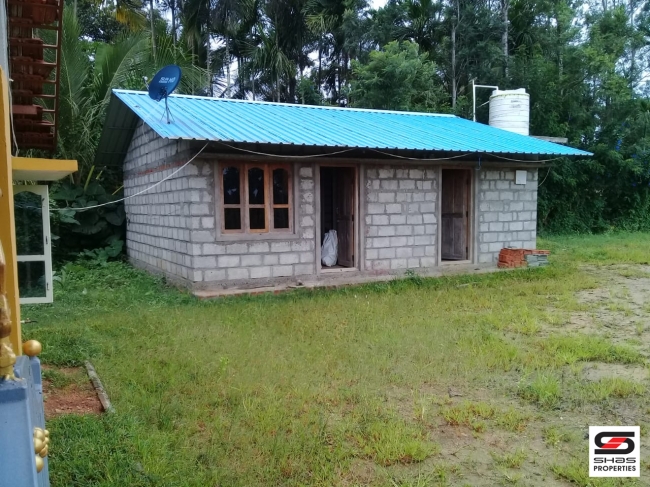 Agricultural land with farmhouse for sale in Coorg, Karnataka