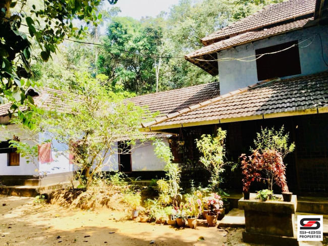 Land with traditional house for sale in Kerala