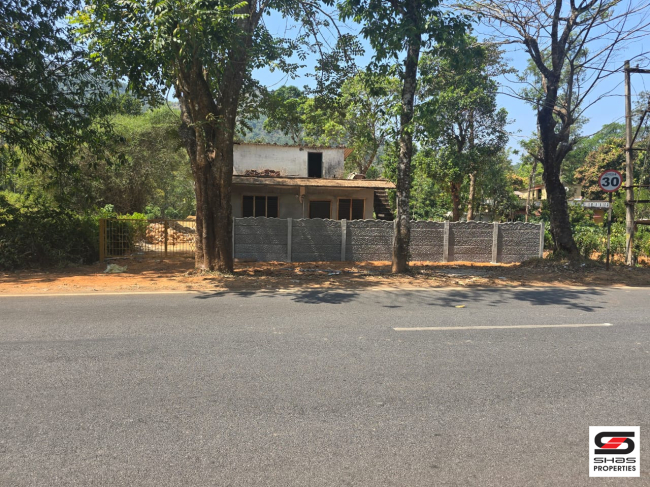 Land with house for sale in Virajpet, Kodagu