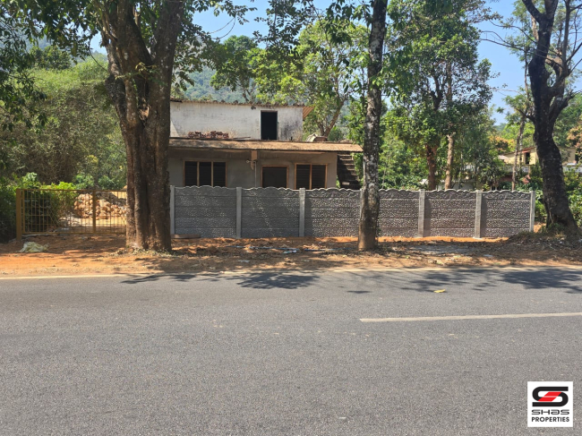 Land with house for sale in Virajpet, Kodagu