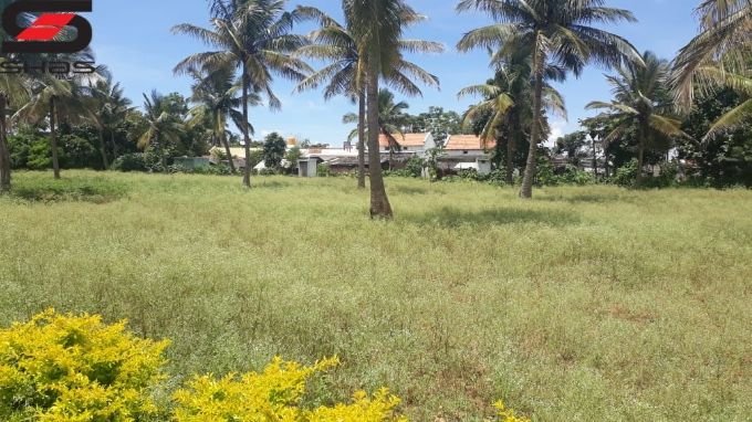 Land with small house for sale in Jayapura, Mysore